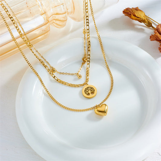 Layered Gold Necklace with Heart & Tree Charms | Romantic Multi-Strand Jewellery